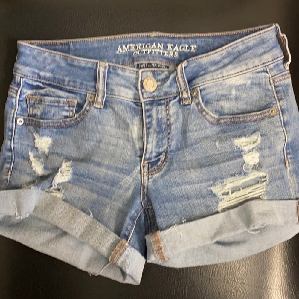 America Eagle X Cafe MIDI distressed jean shorts